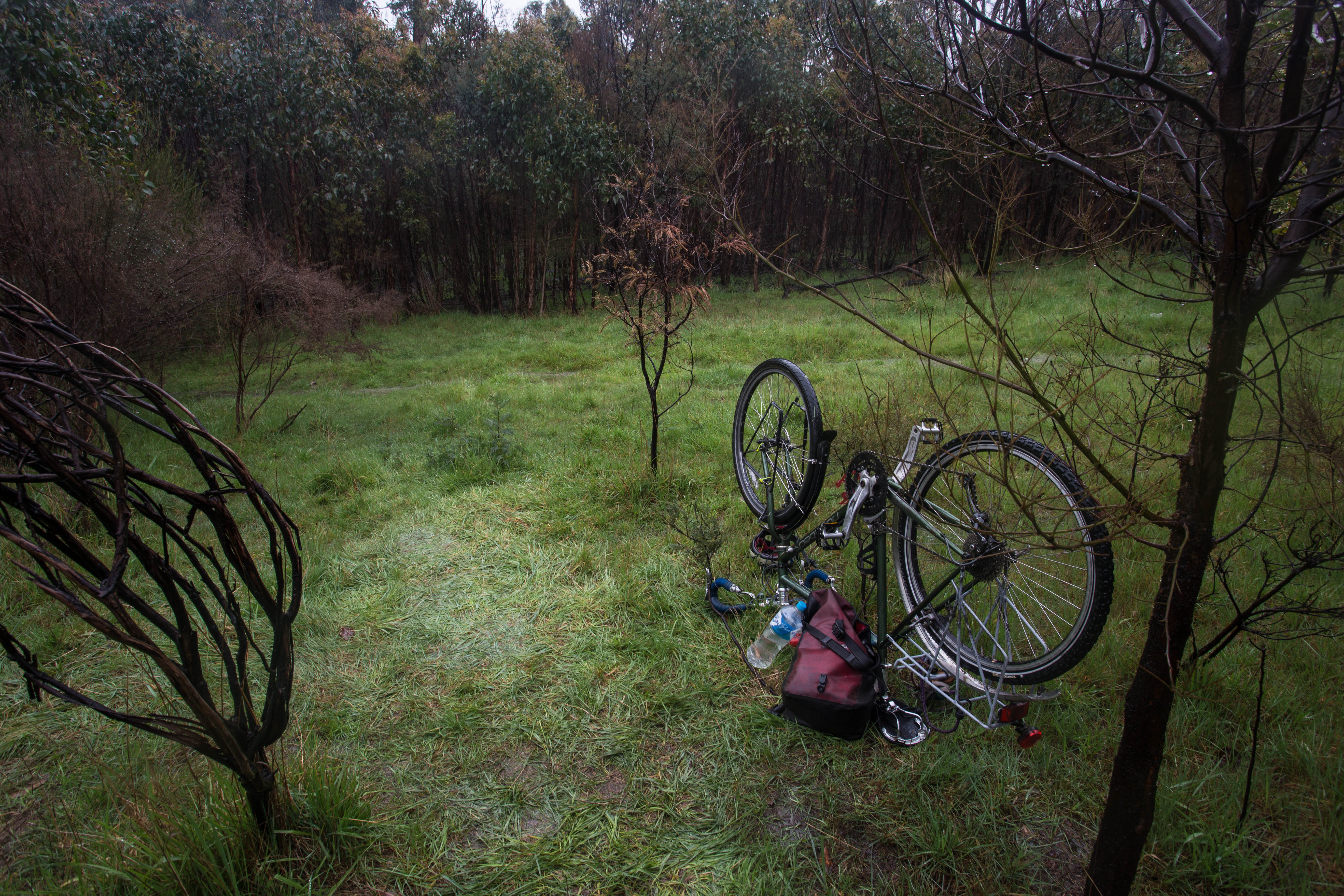 Fixing a puncture in the falling rain after packing up my saturated tent again. At that point, more than anything I wanted to be back in Melbourne with Elana.